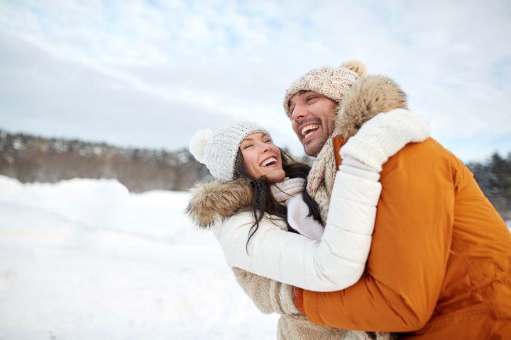 couple hugging in the snow