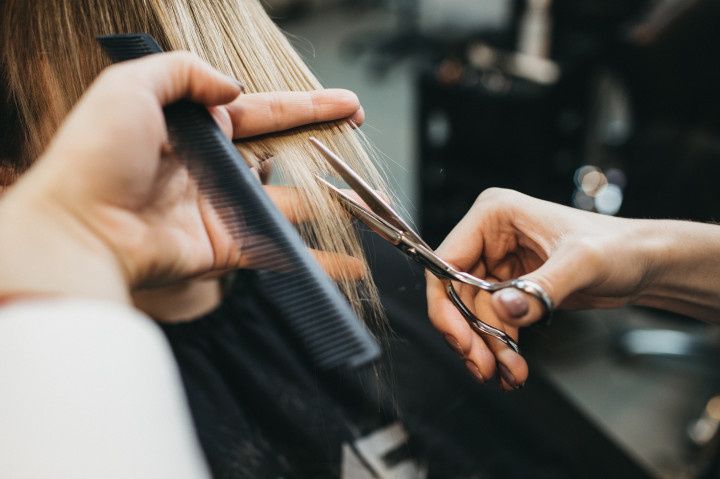 woman getting haircut