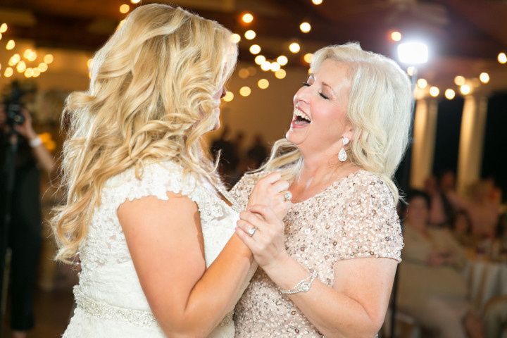 mother-of-the-bride dancing with bride