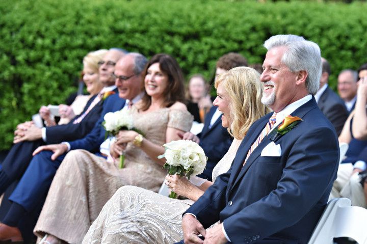 wedding guests sitting at ceremony