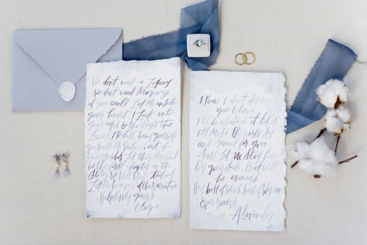 light blue and white watercolor wedding invitations with pale purple accents 