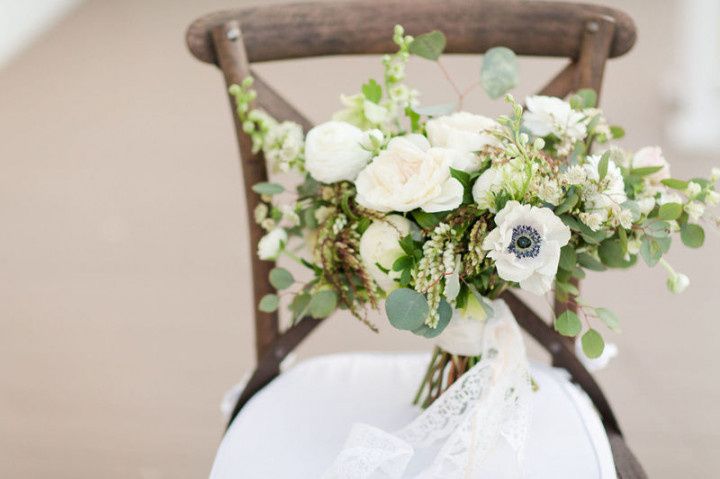 winter wedding bouquet with pieris and anemones
