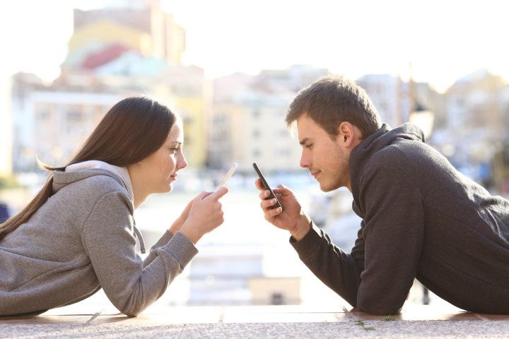 couple on phones