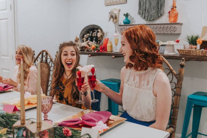 women toasting at brunch