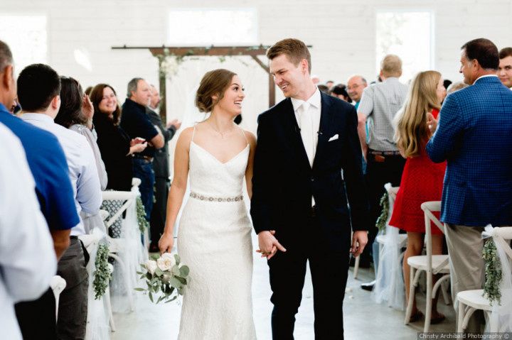 happy couple wedding recessional