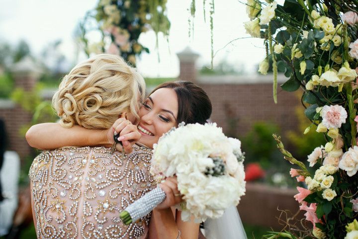 bride hugging older female relative