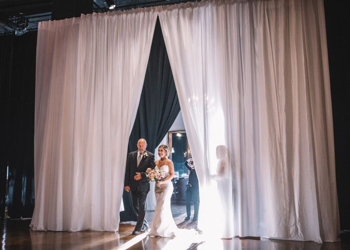 bride and father walking down the aisle