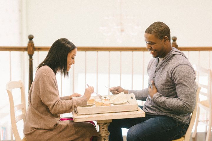 couple enjoying their wedding cake tasting