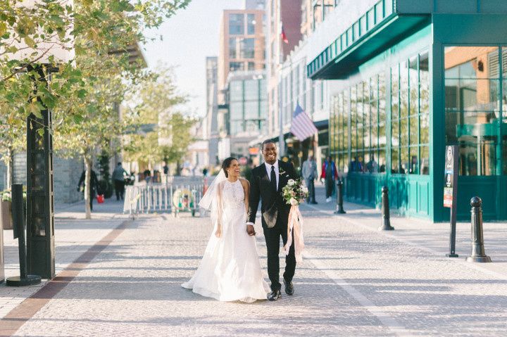 couple walking down city street