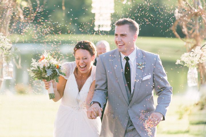 bride and groom recessional with confetti