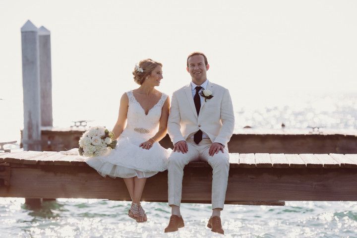 couple on dock destination wedding