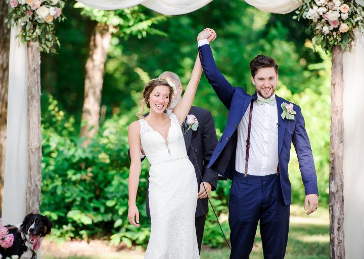 happy couple cheering recessional 