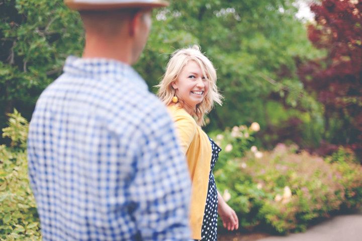 engagement photo couple walking together