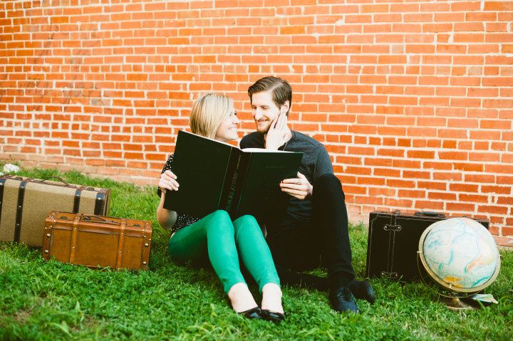 couple reading book engagement photo 