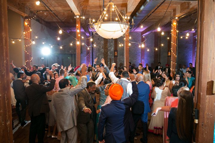 guests dancing at reception 