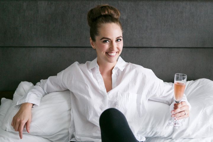 bride relaxing with champagne