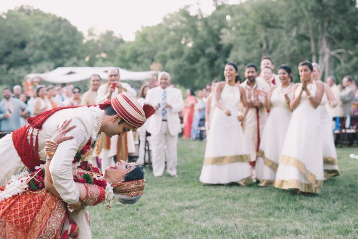 indian wedding couple laughing 