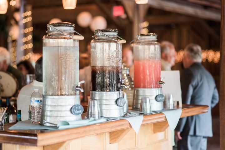 Cocktails on wooden bar rustic mason jar decor 