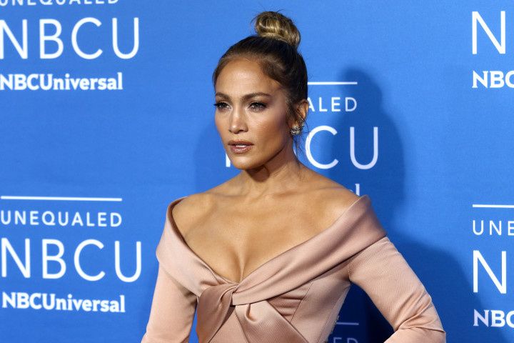 jennifer lopez with hair in topknot