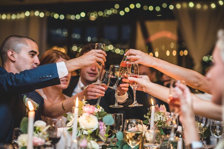 group toasting with champagne