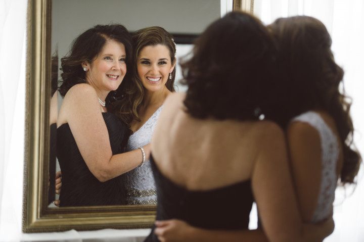 mother hugging bride