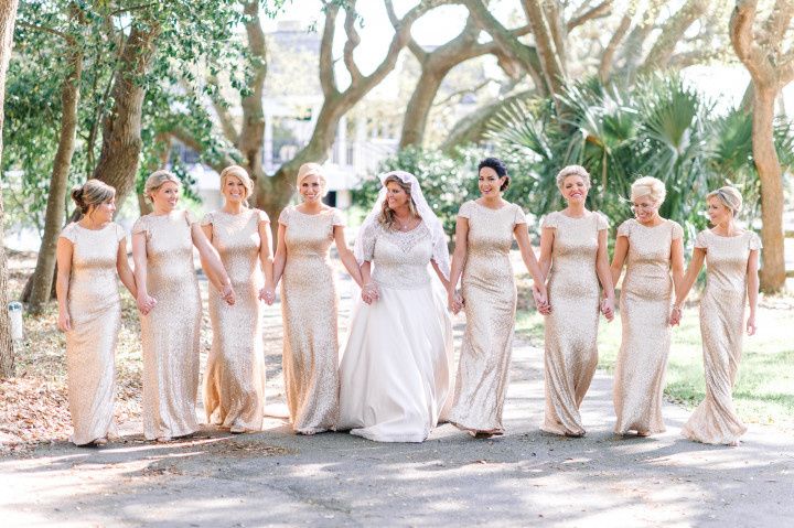 bridesmaids in gold sequined dresses