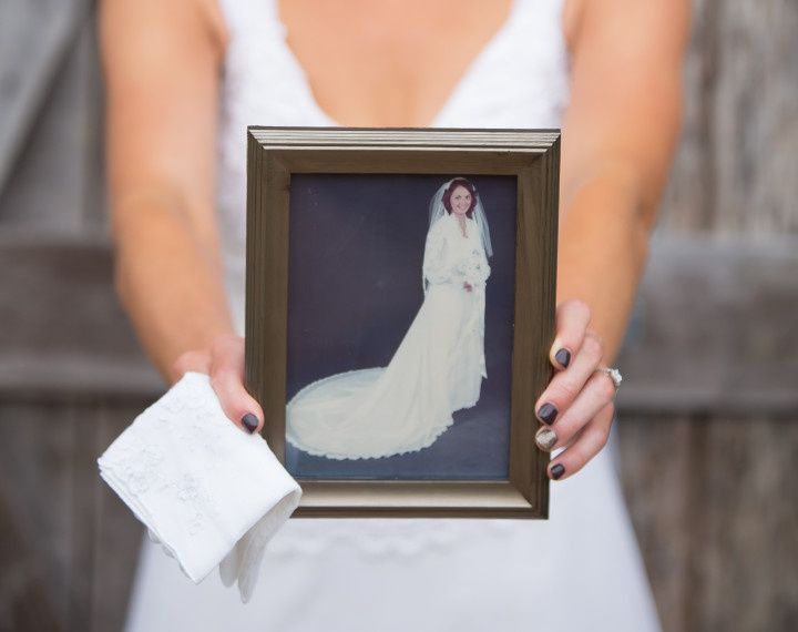 White wedding dress hanging on a door frame at a hotel before a ceremony  Stock Photo - Alamy