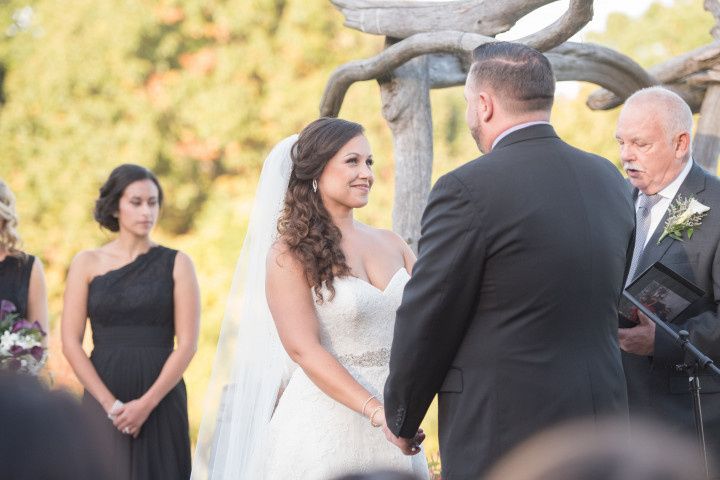 bride looking at groom during ceremony