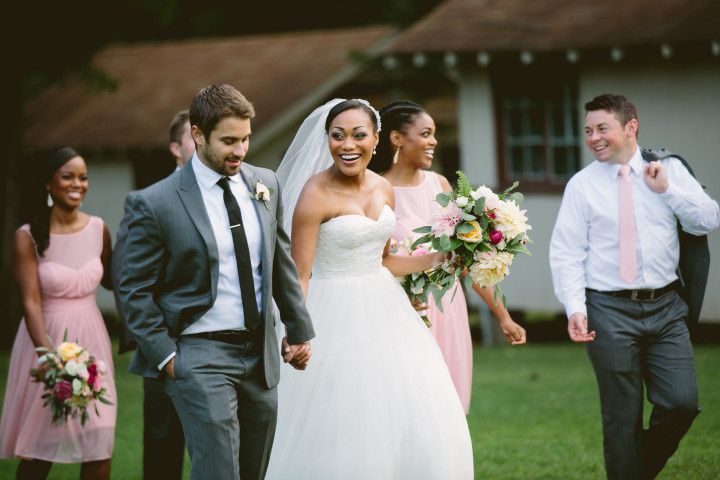 happy couple holding hands walking