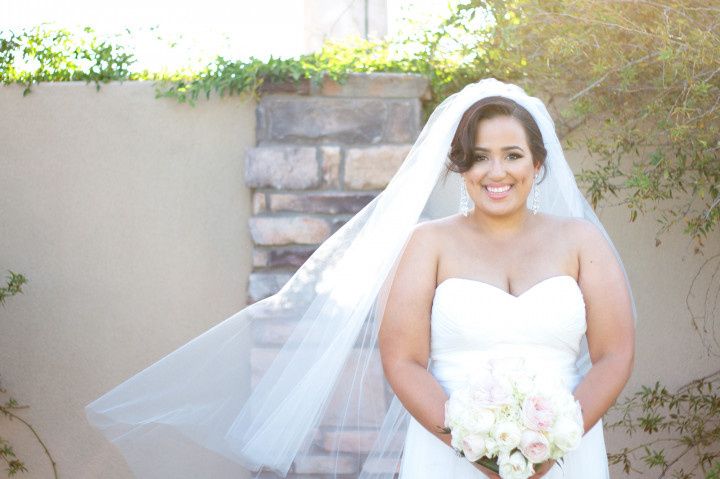 bride with mid-length veil in wind