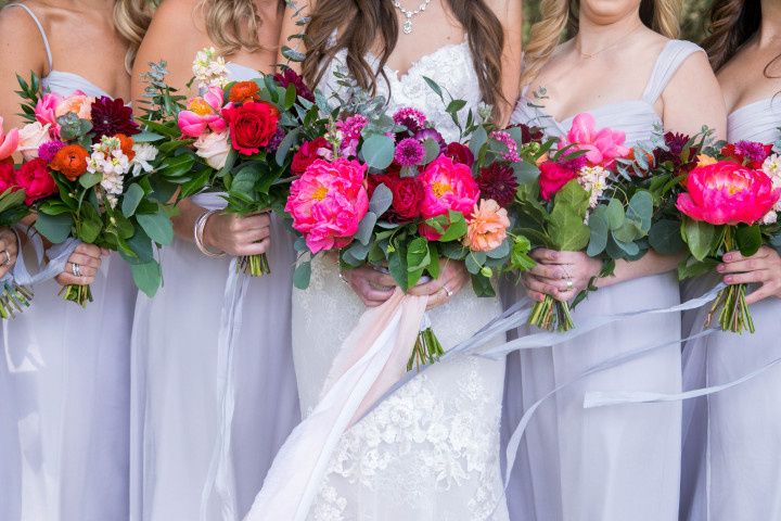 bride and bridesmaid bouquet in bright pink shades
