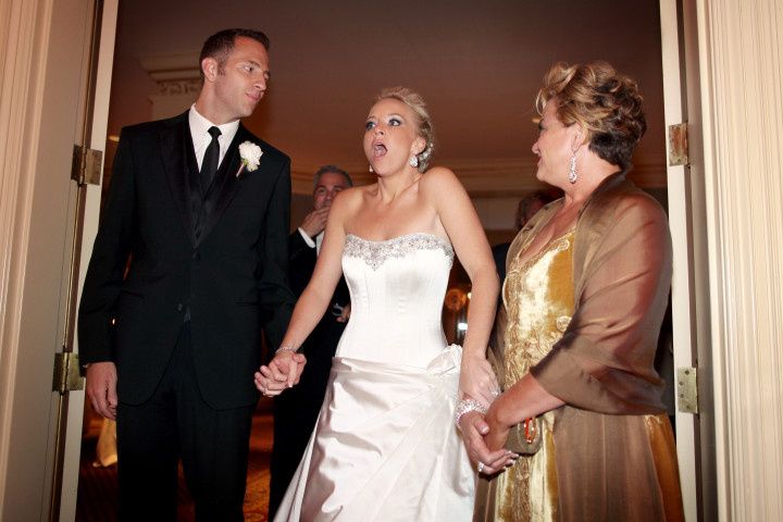 surprised bride entering reception