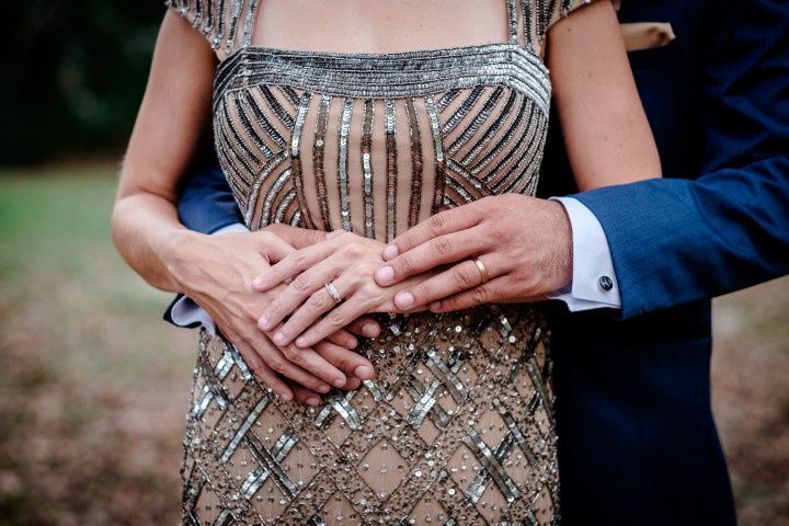 wedding rings couple holding hands