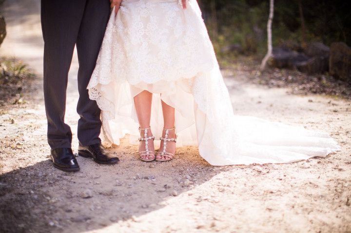 wedding couple showing shoes