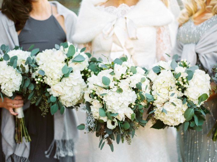 bridesmaids with winter white bouquets