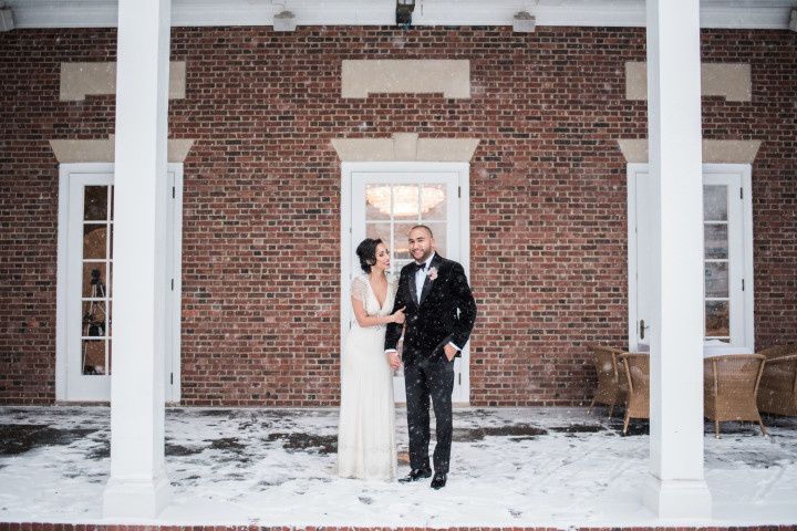 couple with snow wedding