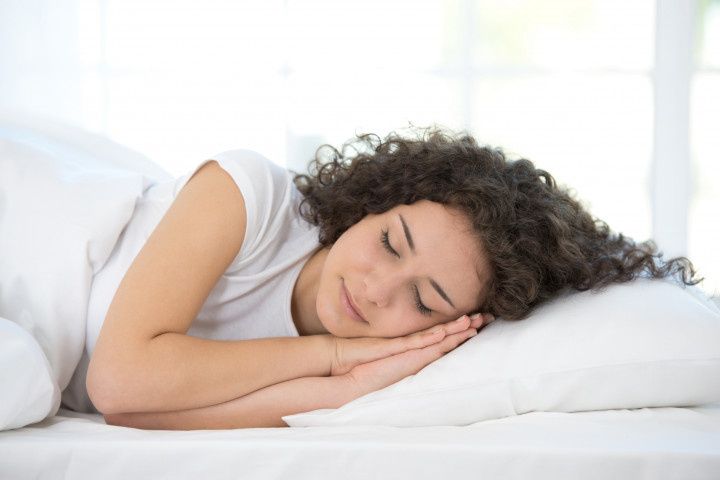 woman sleeping in bed