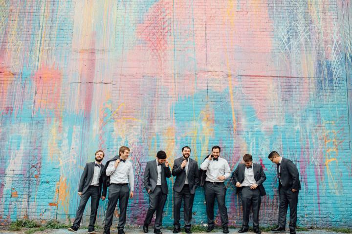 groomsmen laughing mural wall