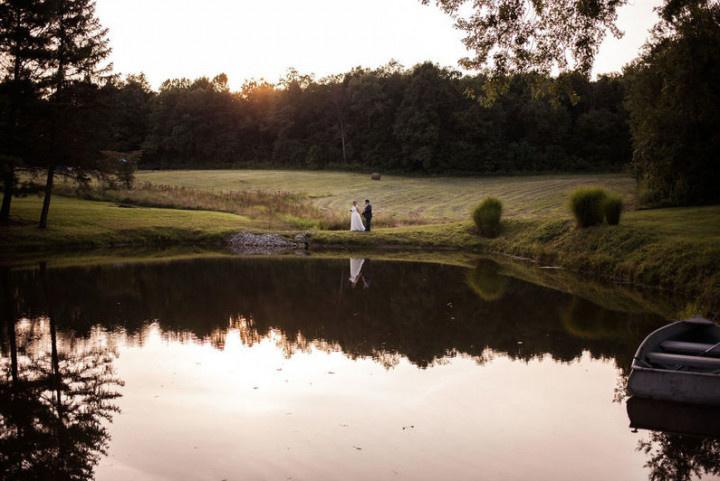 couple posing on pond