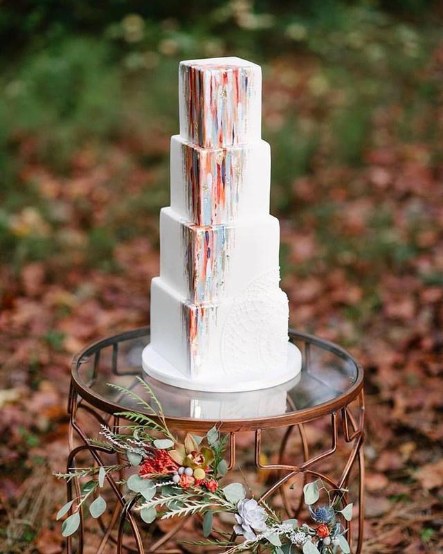 four tier fondant square wedding cake with watercolor details 