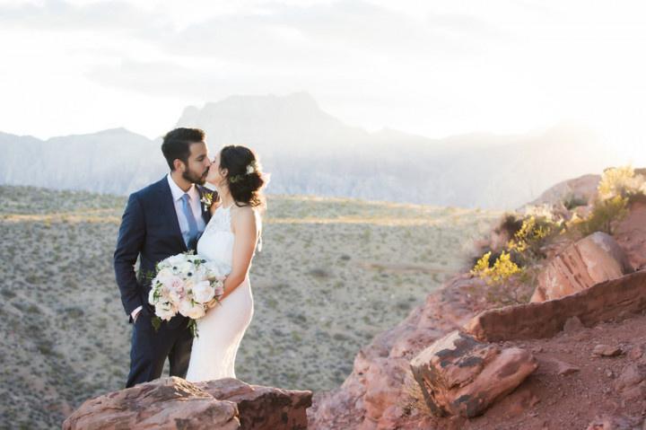 bride and groom kiss at Las Vegas desert elopement 