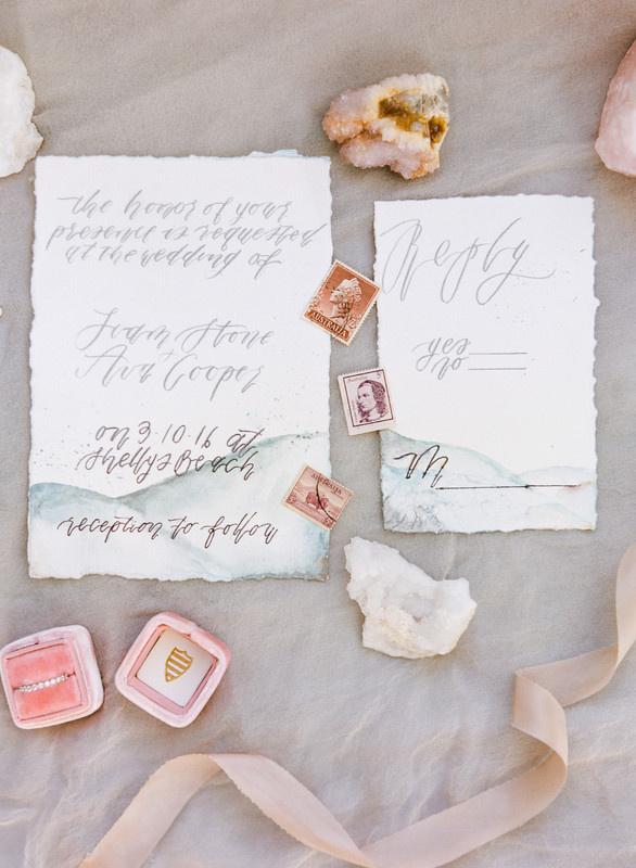 abstract watercolor wedding invitation suite with blue and blush colors