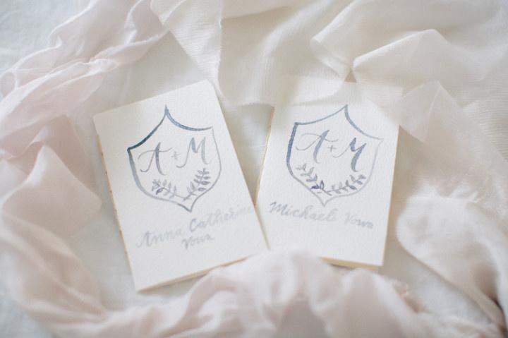 wedding vow notebooks painted with light blue watercolor monogram 