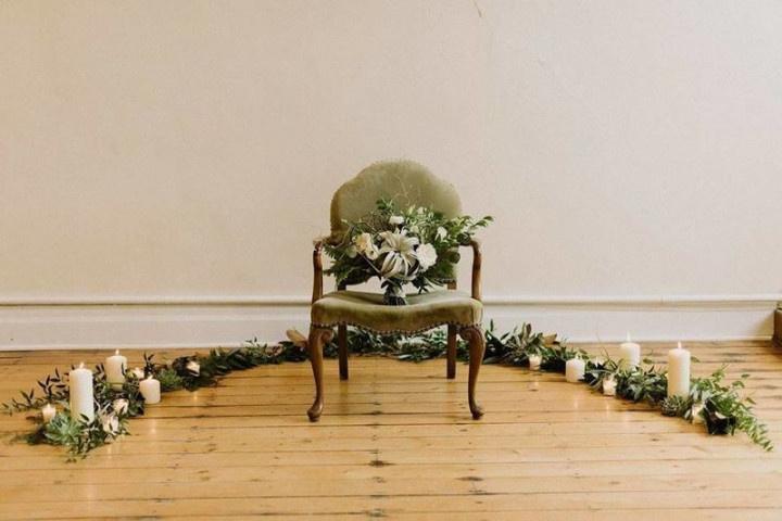 vintage wedding decor green velvet chair with candles