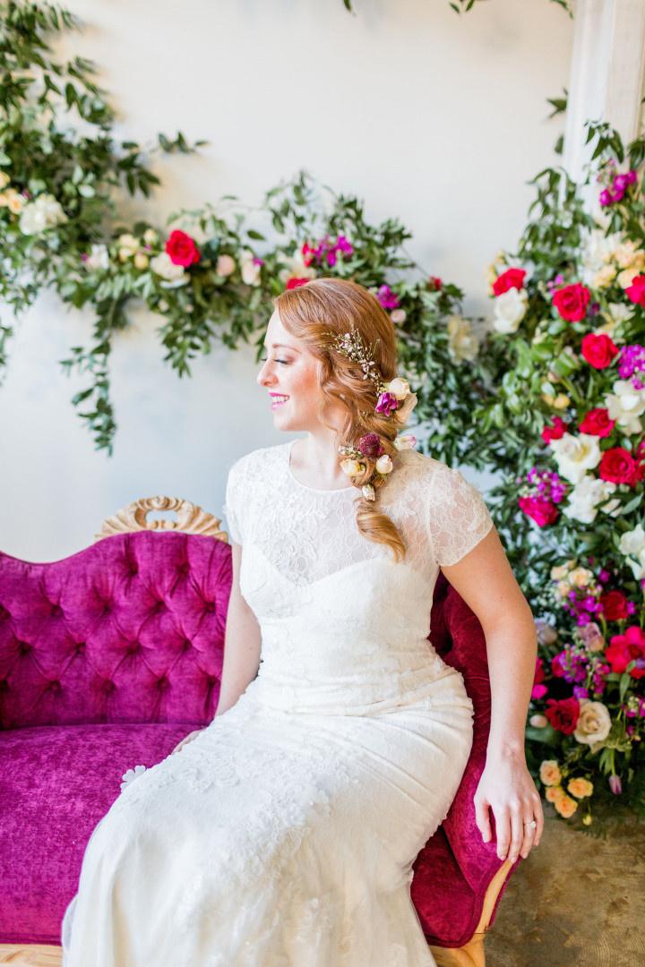 bride on magenta chair
