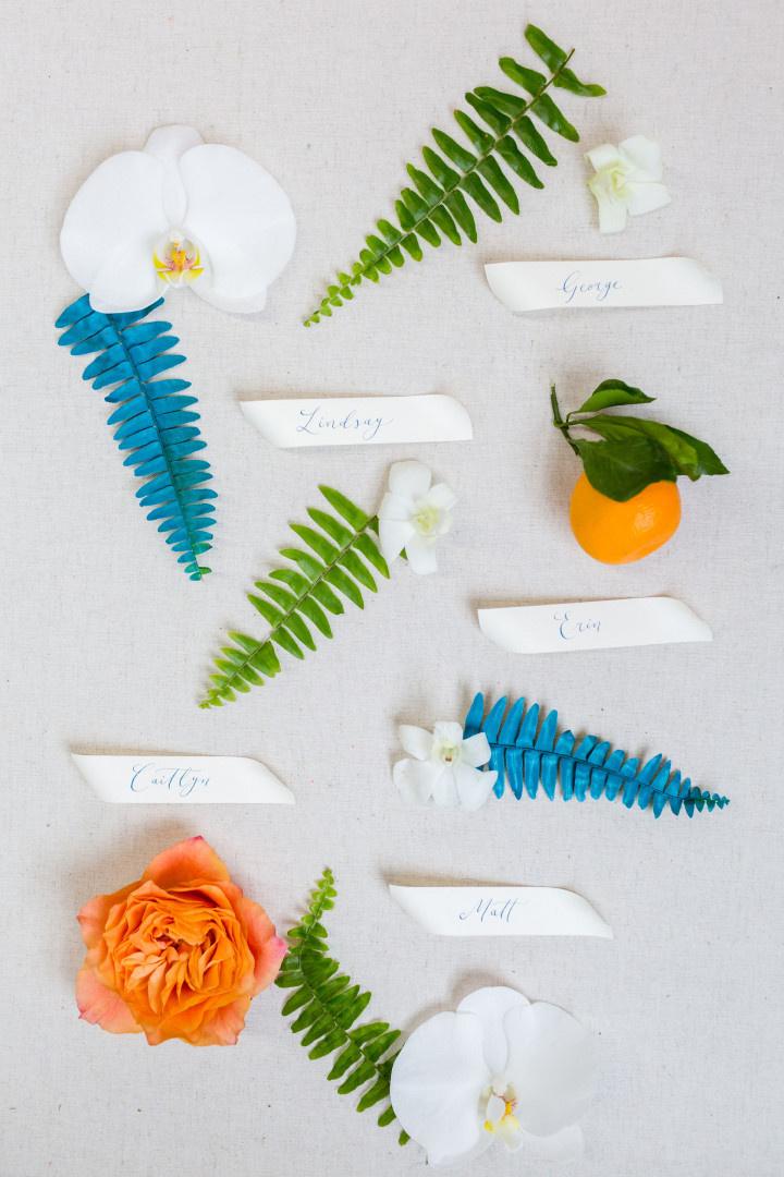 tropical bright summer wedding color scheme with orange, teal and lime green