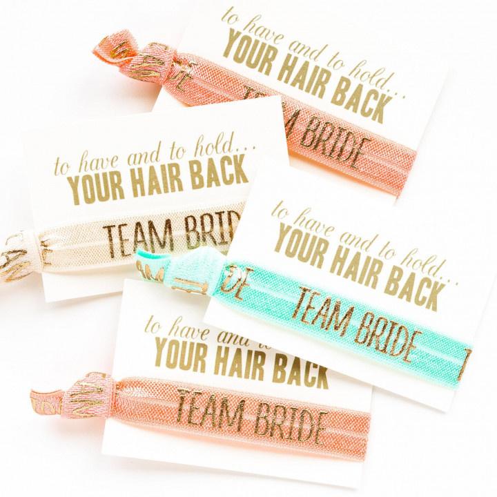 https://cdn0.weddingwire.com/article-gallery-o/00000/original/1280/jpg/editorial-images-2019/6-june/kim/bridal-shower-favors/love-mia-hair-ties.jpeg