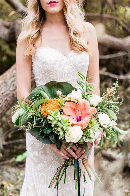 greenery bouquet with pink hibiscus