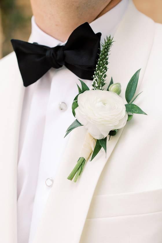 Black Gucci Groomsmen Suits with Bow Ties and Blush Boutonnieres