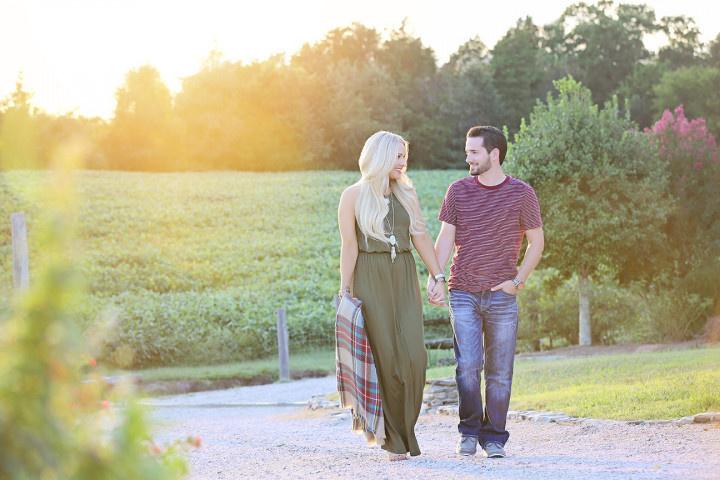 engagement photo couple walking holding hands cortney dryden